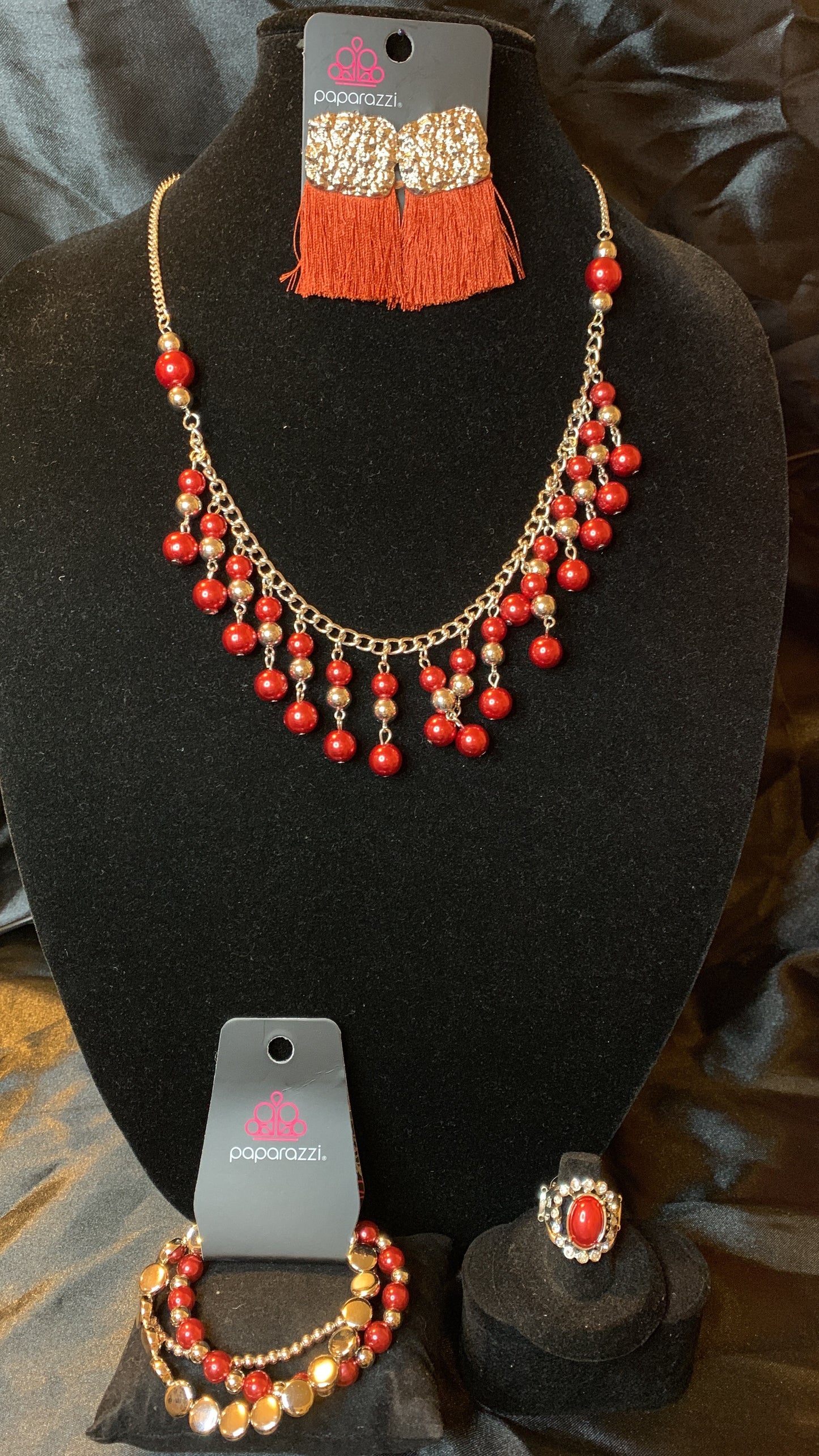 Paparazzi 4pc set color red; includes: necklace, bracelet, earrings and ring