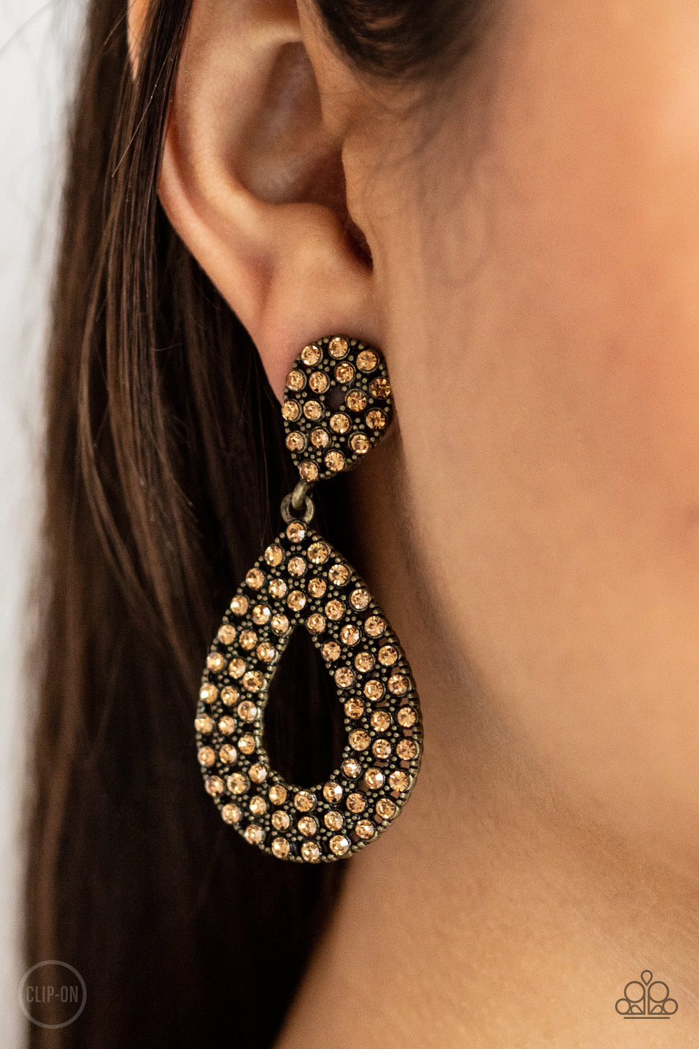 Pack in the PizzazzBrass clip on Earring