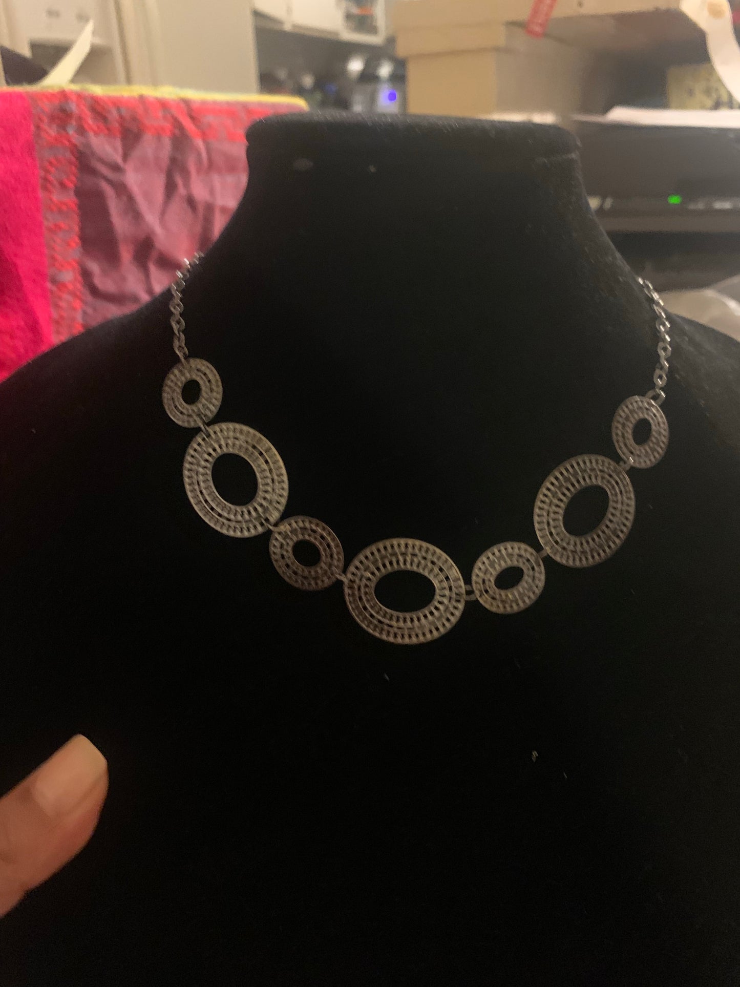 Black necklace with complementary earrings