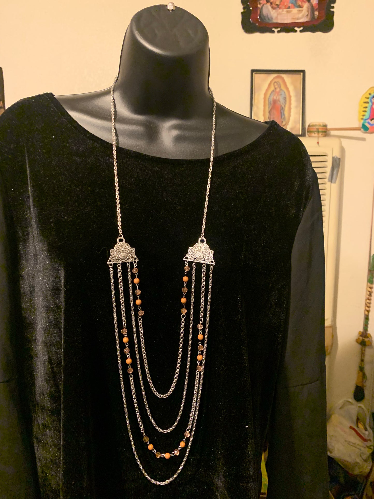 Brown necklace with complementary earrings