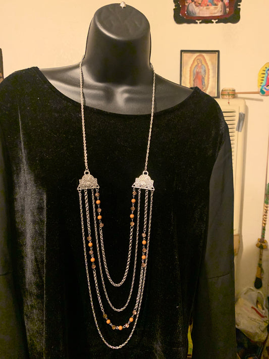 Brown necklace with complementary earrings