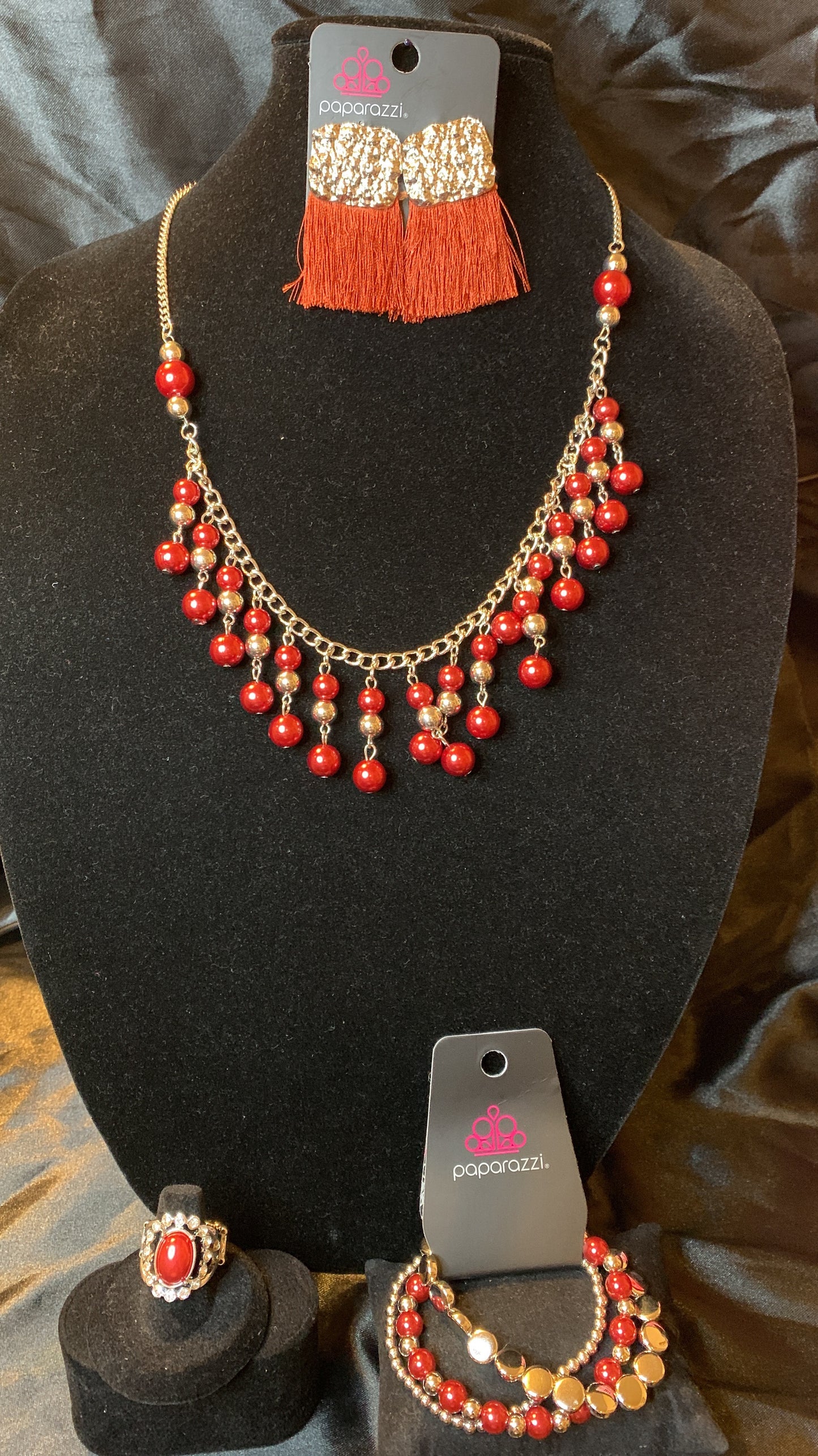 Paparazzi 4pc set color red; includes: necklace, bracelet, earrings and ring